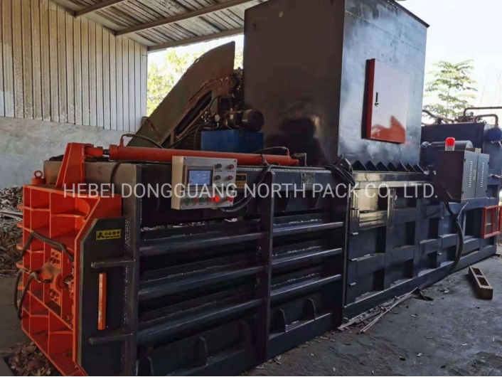 Horizontal automatic hydraulic baling press for cardboard waste